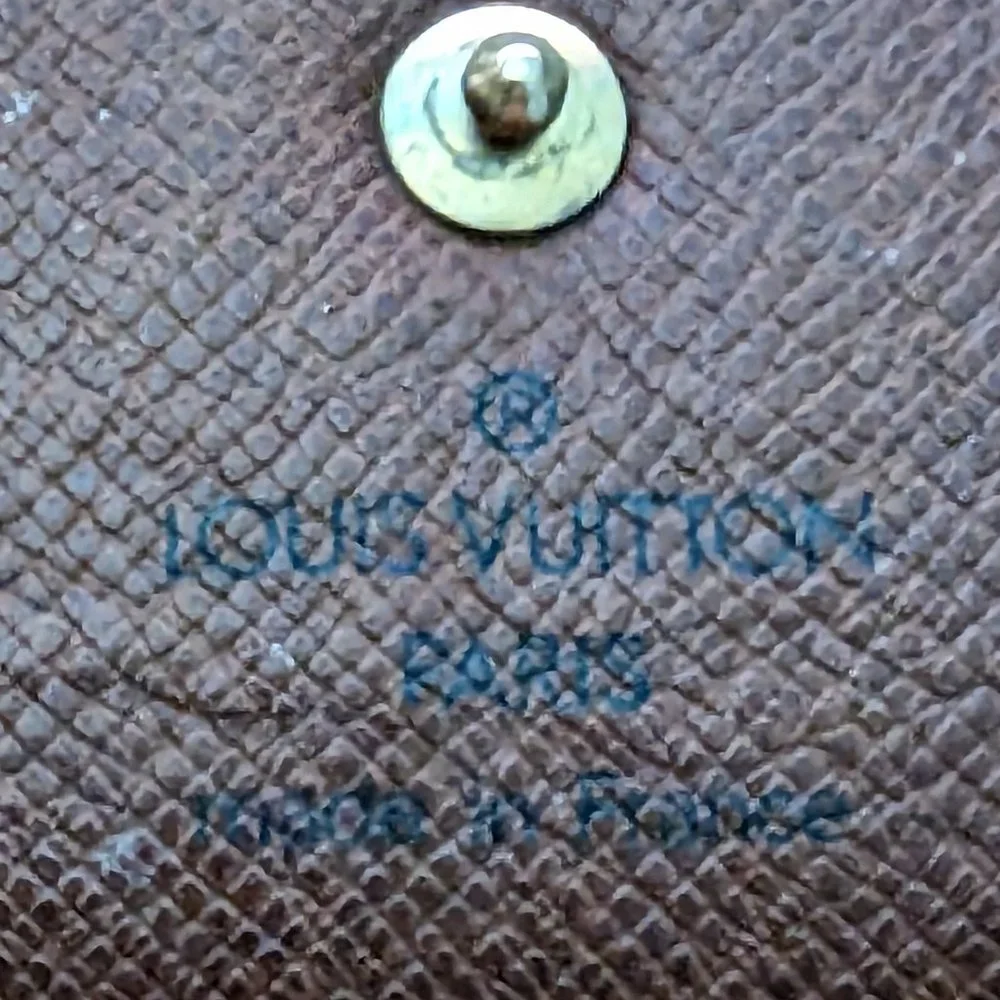 Louis Vuitton please check
